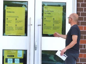 A voter prepares to cast a ballot at a voting station in Sudbury, Ont. on Thursday June 2, 2022. John Lappa/Sudbury Star/Postmedia Network