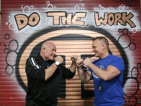 Kevin Philion, left, and Troy Thompson, of The Gym Fitness Center in Sudbury, Ont., pose for a photo in the facility. John Lappa/Sudbury Star/Postmedia Network