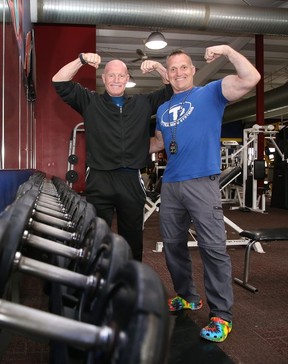 Kevin Philion, left, and Troy Thompson, of The Gym Fitness Center in Sudbury, Ont., pose for a photo.  John Lappa/Sudbury Star/Postmedia Network