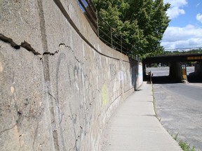 Cracked concrete walls lead to the College Street underpass, as seen on June 13. The underpass is due for work by 2026.
