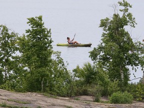 A Kayaker explores Lake Nepahwin in Sudbury, Ont. on Monday June 13, 2022. John Lappa/Sudbury Star/Postmedia Network