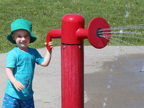 Oliver Dickieson, 2, plays at the Kinsmen Sports Complex splash pad in Lively, Ont. on Tuesday June 14, 2022. John Lappa/Sudbury Star/Postmedia Network