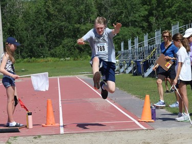 Hunter McNeillie, of Valley View Public School, competes in a long jump event at the elementary school Pentathlon Meet at the Laurentian Community Track Complex in Sudbury, Ont. on Tuesday June 21, 2022. John Lappa/Sudbury Star/Postmedia Network
