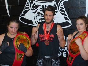 Ayla Frank (left), Justin Savard, and Paige Eastwood, brought home hardware from the recent Canadian Kickboxing Championships in Niagara Falls. They train out of the Sudbury Kickboxing Academy on St. Jerome Street in Sudbury's North end.