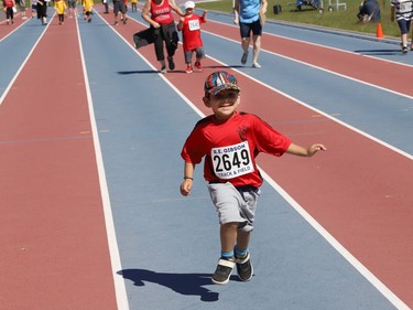 Yuvaan Seghal, of A. B. Ellis Public School, runs to the finish line in a running event at the Rainbow District School Board Challenge Meet at Laurentian Community Track Complex in Sudbury, Ont. on Thursday June 23, 2022. About 330 students with special needs from 22 Rainbow schools participated in a variety of track and field events, including races, high jump, long jump, softball throw and shot put. John Lappa/Sudbury Star/Postmedia Network