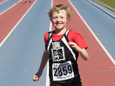 Henry Smith, 9, of MacLeod Public School, is all smiles as he runs to the finish line in a 60 metre race at the Rainbow District School Board Challenge Meet at Laurentian Community Track Complex in Sudbury, Ont. on Thursday June 23, 2022. About 330 students with special needs from 22 Rainbow schools participated in a variety of track and field events, including races, high jump, long jump, softball throw and shot put. John Lappa/Sudbury Star/Postmedia Network
