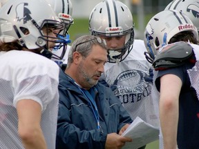 In this file photo, Sudbury Spartans head coach Junior Labrosse speaks with his players during a practice at James Jerome Sports Complex in Sudbury. The Spartans are hoping to keep their perfect season going on Saturday. Ben Leeson/The Sudbury Star/Postmedia Network