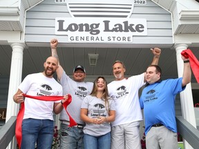 The Long Lake Convenience Store has reopened as the Long Lake General Store in Sudbury, Ont., under new ownership of the Foligno family, Grossi family and Nesci family. On hand for the announcement on Friday June 24, 2022 was Nick Foligno, left, Frank Grossi, Gianna Grossi, Mike Foligno and Ryan Nesci. John Lappa/Sudbury Star/Postmedia Network