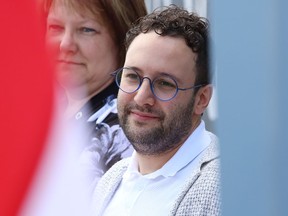 Alessandro Costantini, artistic director of YES Theatre, looks on at a funding announcement for YES Theatre's Refettorio on Durham Street in downtown Sudbury, Ont. on Wednesday June 29, 2022