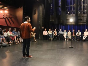 Interim artistic director Alessandro Costantini addresses questions from concerned community members in a town hall Monday evening.