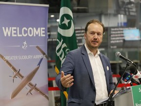 Former Sudbury MP Paul Lefebvre takes part in a funding announcement at the Greater Sudbury airport on July 29, 2021. He is running to become Greater Sudbury's mayor.