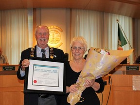 Petrolia Mayor Brad Loosley presents Diane O'Dell with the Ontario Senior of the Year Award during the town's June 27 council meeting. Handout