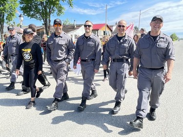 Members of the Institutional Crisis Intervention Team from Monteith Correctional Complex show their support for Special Olympian Caleb Everett-Lessard at the Law Enforcement Torch Run in Iroquois Falls on Thursday. Caleb won gold in the 50 metre sprint in a provincial competition in Toronto in 2019, and hopes to compete again as events kick into gear post-pandemic.

NICOLE STOFFMAN/The Daily Press