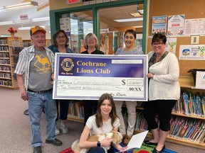 Cochrane Lions Club make annual donation to TD reading program.