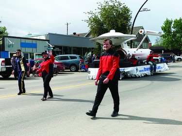 The Town of Vulcan's starship float featured during the Spock Days parade Saturday morning. From left are Joan Grant, wife of Vulcan Mayor Tom Grant, Coun. Judy Sanderson and Coun. Will Smith. Behind them are Tom Grant, driving the starship float, and Coun. Cole Dunham.