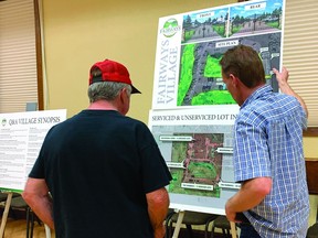Pristine Homes had numerous display set up June 21 at the Vulcan Lodge Hall to show local residents its plan for a proposed RV park.