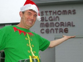 Richard Auckland, incoming Christmas Care president, dons his elf costume to share the organization's need for a new home this year. The city has offered space at Memorial Auditorium but the campaign's need is even greater. (Eric Bunnell/Special to Postmedia Network)