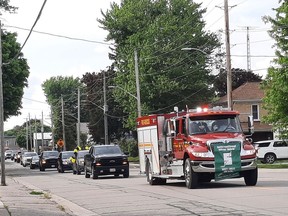 The parade held in West Lorne in celebration of the U9 West Lorne Comets and their incredible season.  The banner, signed by the team members on the back, hangs proudly off the fire engine.  Victoria Acres