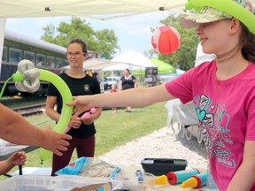 Calissa Curry, 12, creates animals and flowers with balloons during the Waterfront Festival Kids and Youth Day at the Owen Sound Visitor Centre Thursday afternoon. Greg Cowan/The Sun Times