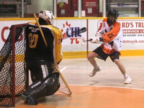 Dom Millman takes a shot from in close on Jaxon Longboat in the second period as the Owen Sound North Stars host the Hamilton Bengals in the Ontario Junior B Lacrosse League regular-season finale inside the Harry Lumley Bayshore Community Centre on Sunday, June 19, 2022. Greg Cowan/The Sun Times