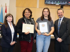 On Tuesday, (l-r) Northern Gateway Public Schools board chairperson Barb Maddigan, Renee Gray’s mother Penny White, Gray and Superintendent Kevin Bird gathered to recognize Gray. Gray was NGPS’ nominee for the Honouring Spirit: Indigenous Student Award.