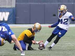 Kicker Ali Mourtada (right) puts up a field-goal attempt at Winnipeg Blue Bombers training camp on Sunday, May 29, 2022.