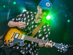 Nick Rose plays a guitar as he performs alongside fellow Dwayne Gretzky band members as they perform at the Bob Wannamaker Amphitheatre in Trenton on Saturday as part of the city's Canada Day long weekend celebrations. ALEX FILIPE