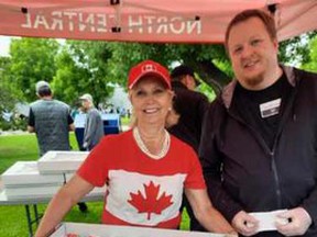 Fort Saskatchewan Mayor Gale Katchur posed with Co-op staff, who provided Canada Day cupcakes at the City's Canada Day celebrations over the weekend.