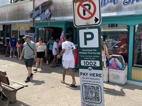 Motorists received more than 120 parking tickets over the busy long weekend as Norfolk County dealt with bugs and beefs about the new paid parking areas and high-tech parking machines. SUSAN GAMBLE