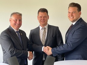 Stratford Mayor Dan Mathieson (left) shakes hands with Hägele GmbH CEO Benjamin Hägele and co-CEO Steffen Hägele in Schorndorf, Germany on Wednesday. Hägele GmbH, the parent company of Cleanfix North America, announced Thursday it is expanding its production facility in Stratford. (Contributed photo)