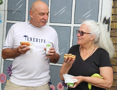 Darrell Payette and Marguerite Thibaydeau attend a barbecue at Albert and Gore streets near the former Neighbourhood Resource Centre on Thursday, July 7, 2022 in Sault Ste. Marie, Ont. (BRIAN KELLY/THE SAULT STAR/POSTMEDIA NETWORK)