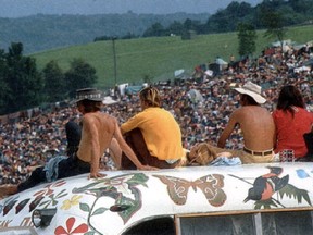 Half a million people gather on a dairy farm in Bethel, N.Y., in 1969 to listen to the likes of Jimi Hendrix and The Who at the Woodstock music festival. Postmedia Network