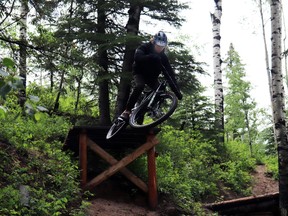 Karter Lang took to the air off the double black feature, built by young members of the Whitecourt Mountain Bike Association and completed this summer.