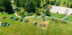 An aerial photograph that captures some of the 289 registered vehicles.  Eric Neyens