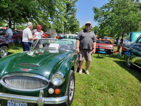 Ted Bear poses with his 1967 Austin Healey 3000 MKIII. Bear said that he bought it in the 1970s and it's been a restoration project. "It might be due for some more restorations" Bear jokingly admitted, pointing to a couple of small scuffs caused by his grandson's bicycle. Victoria Acres