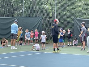 Granite Tennis Club pro Fransua Rachmann working with the tennis stars of tomorrow.