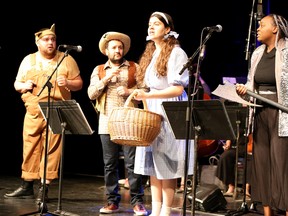 Cast members from The Wizard of Oz: In Concert (from left) Jake Deeth, as the Lion; Alessandro Costantini, as the Scarecrow; Maryn Tarini, as Dorothy; and Elsa Simbagoye, as the Tinman, perform a musical number during a media call at Sudbury Theatre Centre in Sudbury, Ontario on Thursday, July 14, 2022. Directed by Ruthie Nkut and co-produced by STC and YES, The Wizard of Oz: In Concert runs July 14-17. For more information, visit www.yestheatre.com/the-wizard-of-oz. Ben Leeson/The Sudbury Star/Postmedia Network