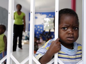 Children are pictured in Nkosi's Haven, a shelter and care for destitute HIV-infected mothers and their children in Johannesburg. Africa has the highest number of women and children with AIDS due to the ‘irresponsibility and lust of men,’ writes Gene Monin. STEPHANE DE SAKUTIN/AFP/Getty Images