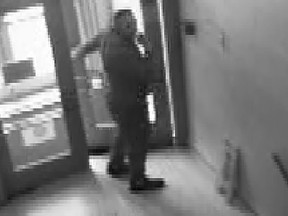 Kingston Military Police are searching for this man who was captured by security cameras breaking into the Kingston Military Family Resource Centre at the end of June.
