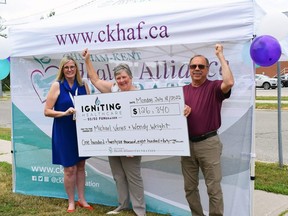 Wendy Wright, centre, and Mike Veres, right, celebrate winning the 2022 Igniting Healthcare 50/50 FUNdraiser with with Mary Lou Crowley. president and CEO of the Chatham-Kent Health Alliance Foundation, left. (Handout/Postmedia Network)