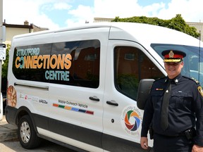Stratford Police Chief Greg Skinner stands next to the Stratford Connections Center mobile-outreach van, which is used by local outreach workers to bring food, water, basic supplies and other support services to those experiencing homelessness in Stratford.  Galen Simmons/The Beacon Herald/Postmedia Network