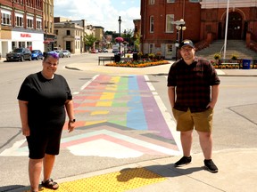 Stratford-Perth Pride and Sirkel Foods owner Kelly Ballantyne have once again partnered to raise $7,000 to replace Stratford's damaged rainbow crosswalk. Pictured, Ballantyne and Stratford-Perth Pride president AJ Adams stand in front of the rainbow crosswalk at Wellington Street and Downie Street in the city's downtown. Galen Simmons/The Beacon Herald/Postmedia Network