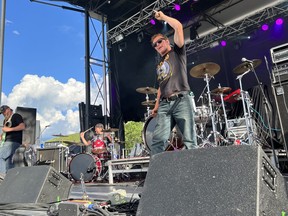 High Holy Days, featuring vocalist Marc Arcand, guitarist Bill MacGregor, bassist Chris Amey and drummer Brian Finner, took to the stage at Hollinger Park on Friday to open the 2022 edition of Rock On The River. Rock On The River, presented by the Timmins Festivals and Events Committee, is scheduled to continue on Saturday. ANDREW AUTIO/THE DAILY PRESS