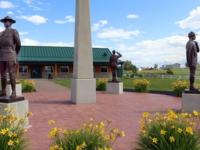 During the night of June 30 an unknown vandal used spray paint on the library and Fallen Four Park statues.