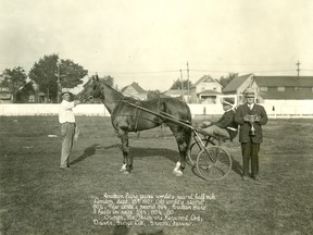 Grattan Bars paced a world’s record half-mile in London on Sept. 16, 1927.  Shown here with the new champion horse are owner Fred Thrower holding the cup, driver George Litt on the sulky, and groom Mr. Farrow.
Photo: Museum Strathroy-Caradoc