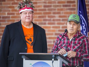 Tyendinaga Chief R. Donald Maracle, left, stands alongside residential school survivor Wilbert Maracle as he recounts his life at the Market square behind Belleville City hall for the first ever National Day for Truth & Reconciliation. ALEX FILIPE