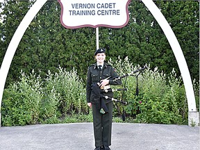 Sgt. Mckenna Sharpe of 19 RCACC Portage La Prairie poses in front of the Vernon Cadet Training Centre arches with her pipes. (supplied by 2Lt Naima Said)