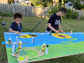 Dominic, left, and Kiara Barrow, volunteer artists from Young Theatre Players, are getting ready for the KidsZone at this year's Simcoe Heritage Friendship Festival. YTP is sponsor of the KidsZone. CONTRIBUTED
