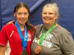 Manitoulin native Mya Balfe, left, was part of the silver medal-winning Team D volleyball contingent, while Sudbury coach Carrie Welsh was part of the staff for the bronze-medal Team H crew at the Ontario Summer Games.