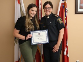 Julia Kinna receives an IODE Canada Annual Award from Sara Cunningham, deputy chief of Greater Sudbury Police. Police photo